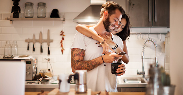 happy couple in kitchen